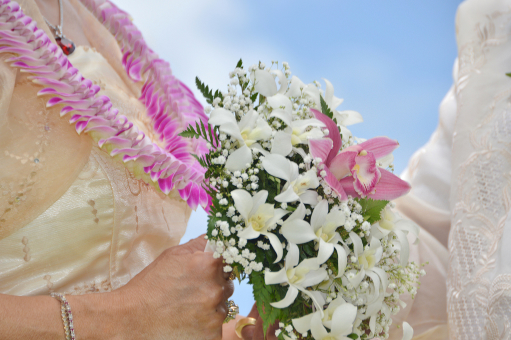 orchid bouquet and lei